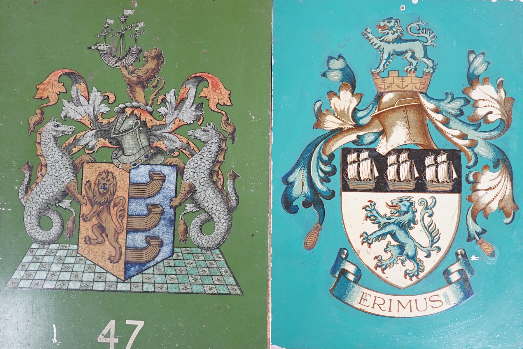 Four tin and enamel armorial signs, largest 38 cms x 36 cms